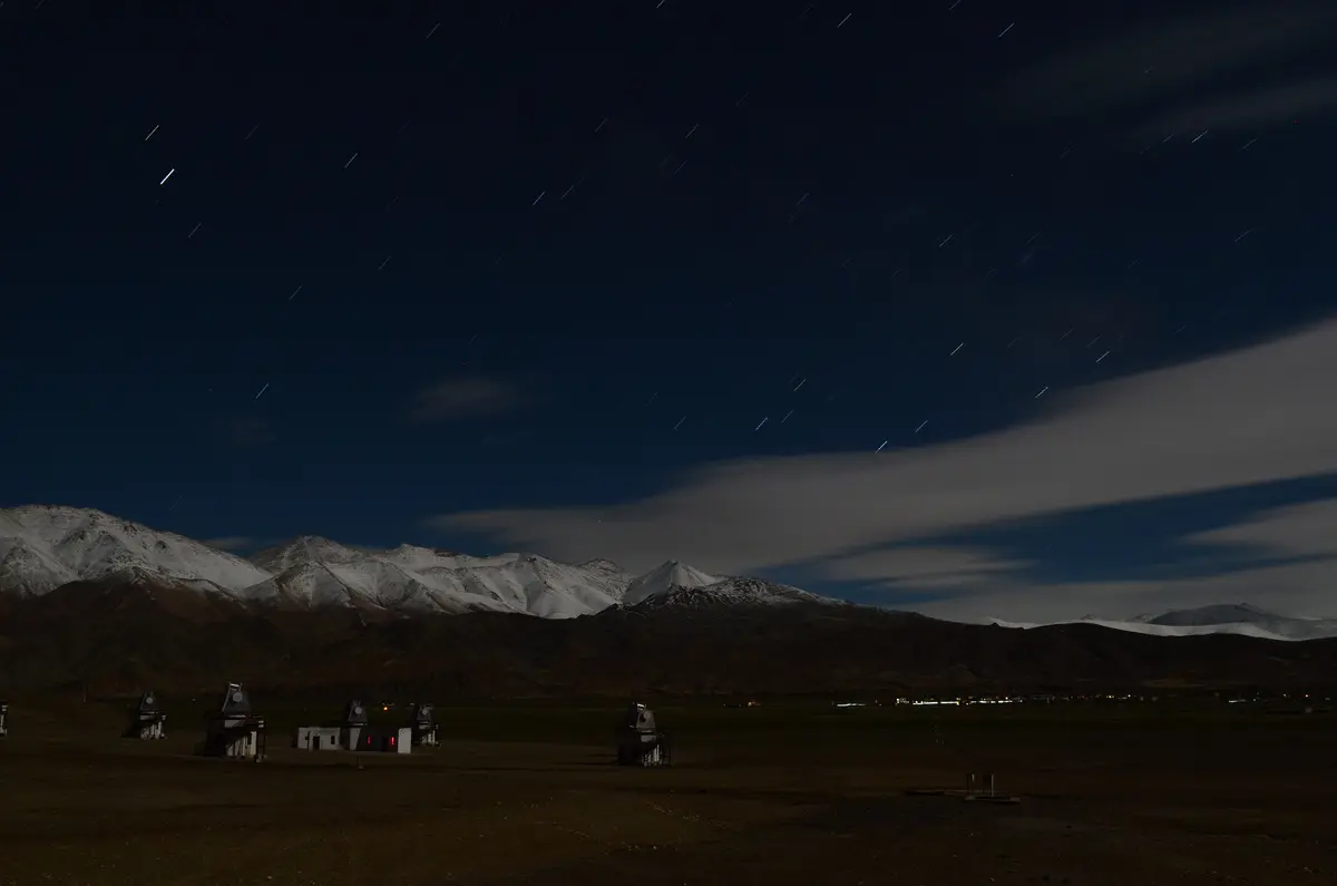 Telescopes of the Indian Astronomical Observatory on a ridge at Hanle at night