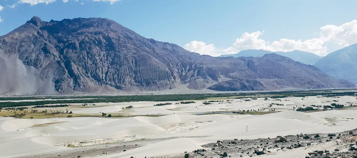 Sandy valley floor and mountains in the Nubra Valley