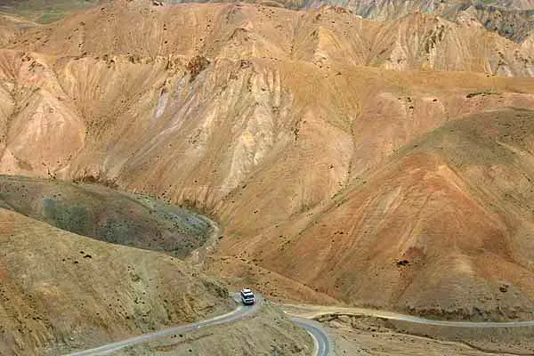 A bus on the mountain road between the Kashmir Valley and Ladakh