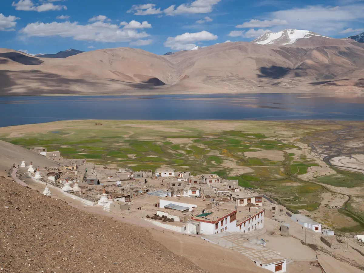 Karzok village houses and monastery above the shore of Tso Moriri